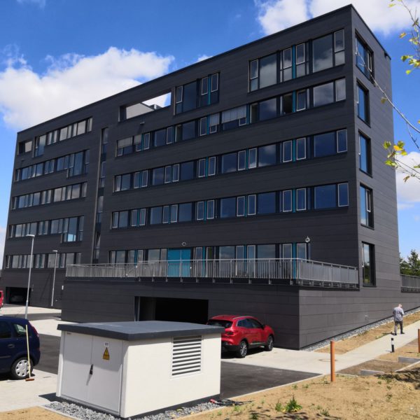 Infosim Würzburg Hinterlüftete Faserzement Fassade Eternit EQUITONE natura