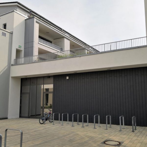 Wohn- und Geschäftsgebäude Maisach Faserzement Fassade Eternit Cedral u. Textura Wohn- und Geschäftsgebäude Maisach Faserzement Fassade Eternit Cedral u. Textura